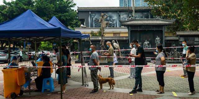 Residents line up for Covid-19 screening in Chengdu in southwestern China's Sichuan province Tuesday, Aug. 30, 2022. Chinese authorities have locked down Chengdu, a southwestern city of 21 million people, following a spike in COVID-19 cases. 