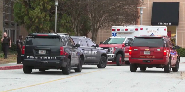 A teenager accidentally fired a gun Saturday while shopping at a mall in Georgia, injuring himself.
