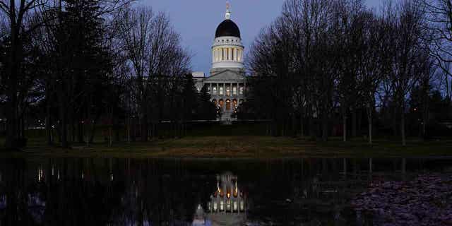 The Maine State House is seen at dawn on Dec. 2, 2020, in Augusta, Maine. Democratic leaders in the Maine Legislature passed through a $9.8 billion, two-year state budget that’ll ensure there’s no government shutdown this summer. 