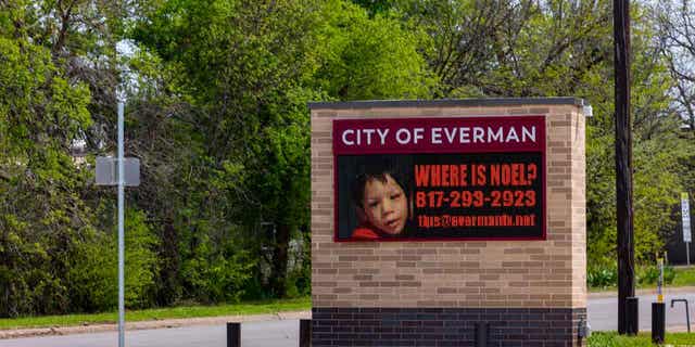A sign displayed outside the Everman Civic Center, on March 26, 2023, asks the community to call in with tips about the disappearance of six-year-old Noel Rodriguez-Alvarez.